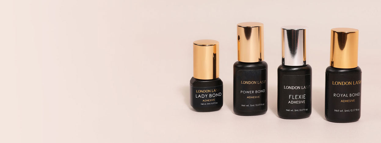 A collection of professional lash glue for eyelash extensions