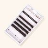 a sample box of mayfair black brown lash extensions with 4 rows of eyelash extensions from 8mm up to 11mm