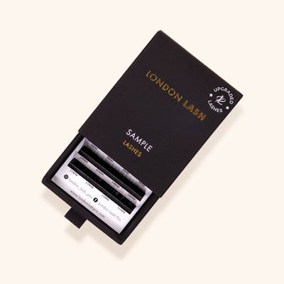 a partially opened sample box of chelsea volume eyelash extensions showing the matchbox design