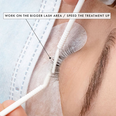 microfiber brushes with a long bendable tip being used on bare lashes during eyelash extensions pre-treatment