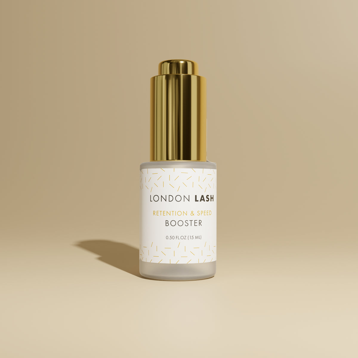 a bottle of london lash booster in a frosted glass bottle with a gold lid