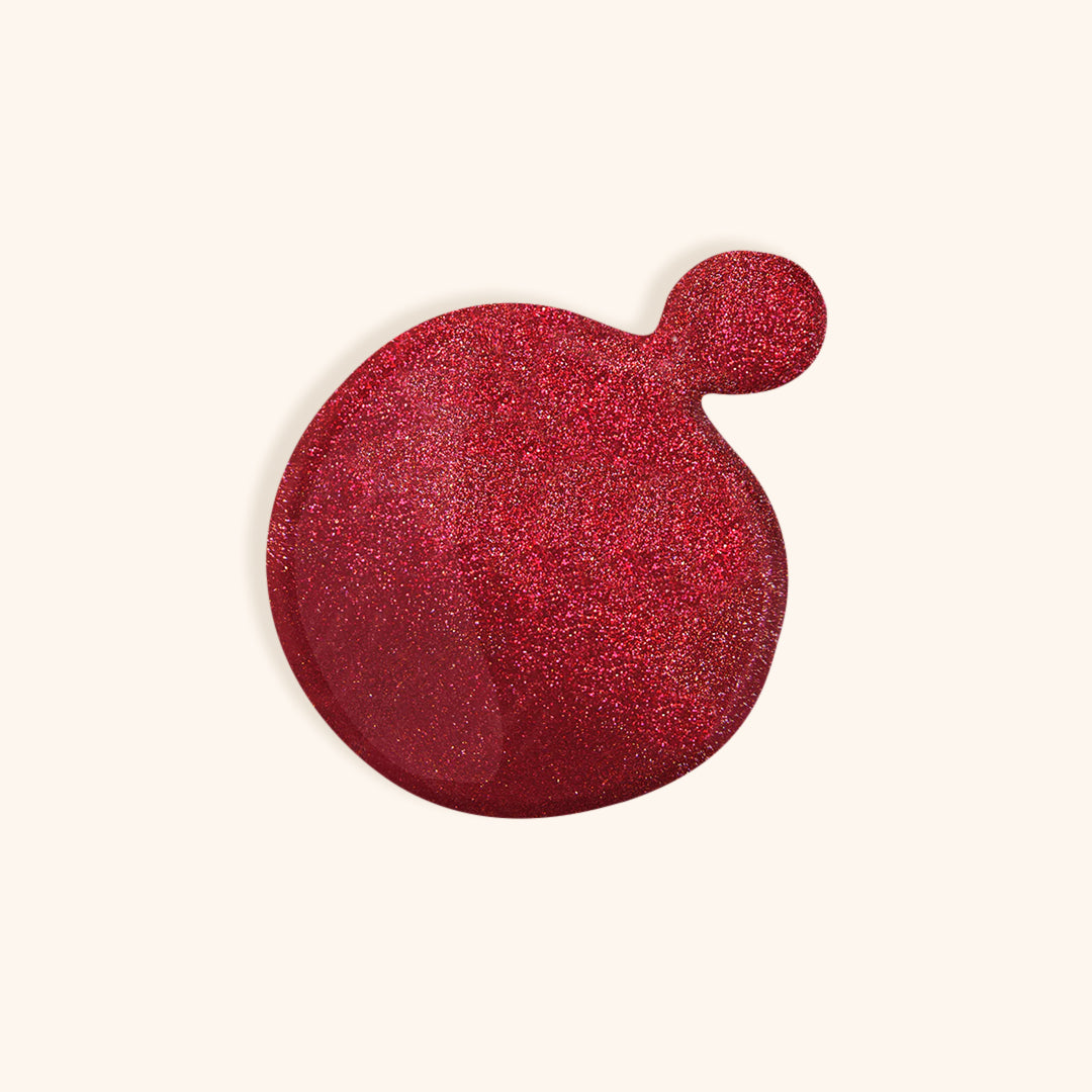 Wine red nail polish with gold shimmer