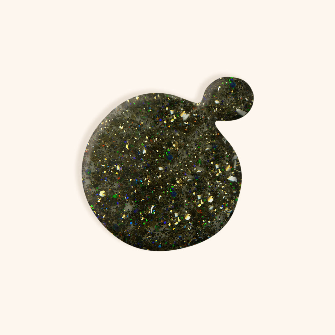 Gatsby green nail polish with silver glitter and hints of brown