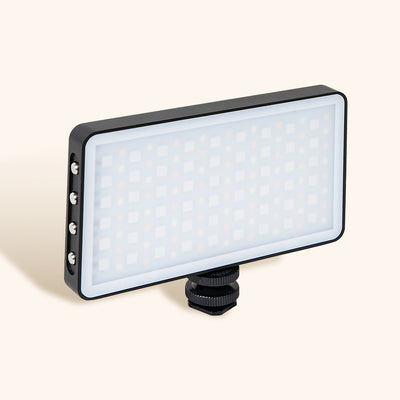 handheld LED light with brightness and color options