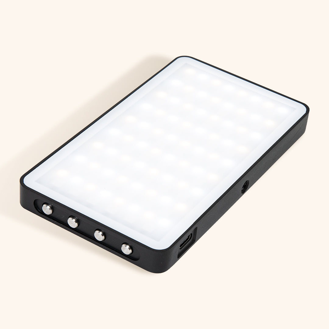 handheld LED light with brightness and color options