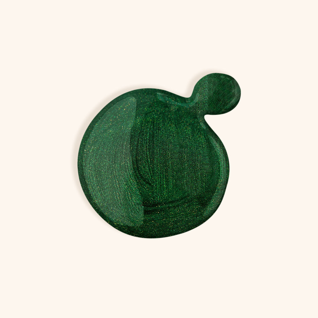 Shimmery dark green nail polish 
