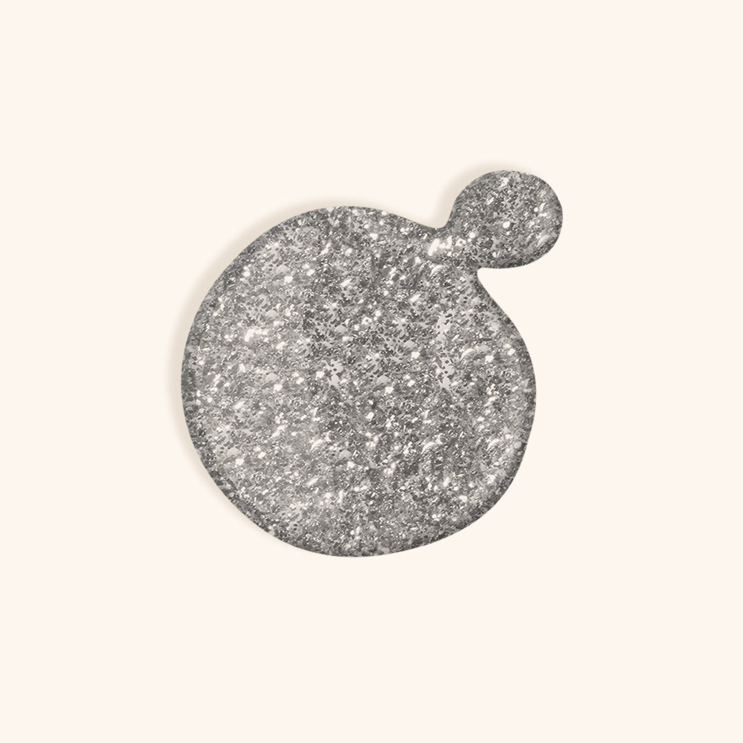 Dazzling silver shimmer gel nail polish in a white bottle