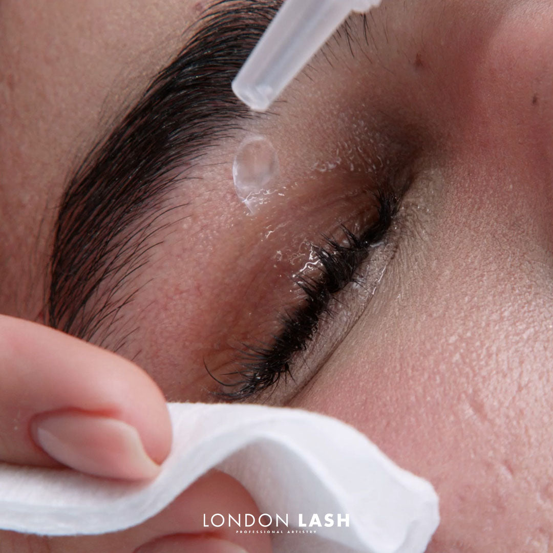 Professional application during lash extension training for eyelash extensions by London Lash.