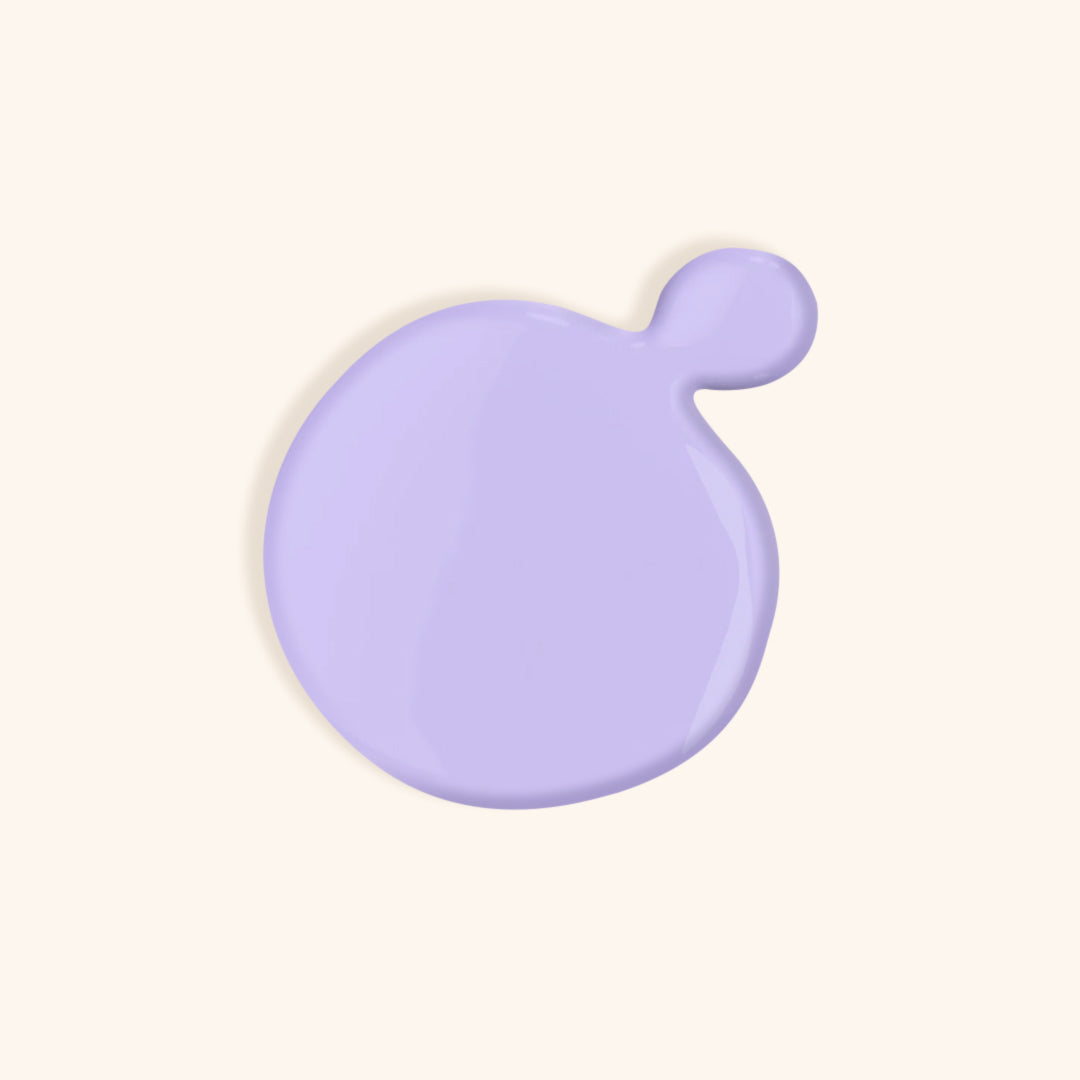 Pastel purple nail polish swatch in front of beige background