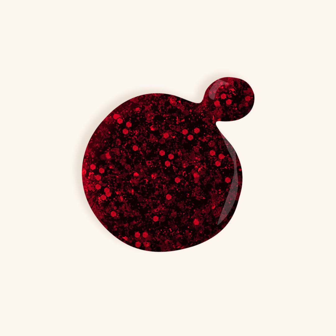 Deep red shimmer gel nail polish in a white bottle