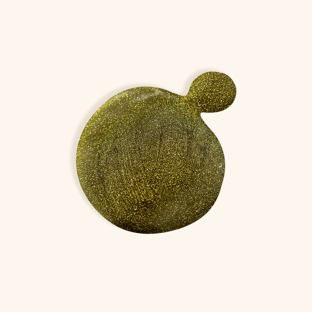 Dark khaki nail polish with gold shimmer in a white bottle