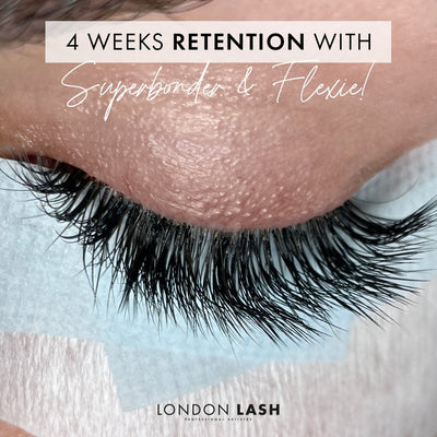 a close up of a set of eyelash extensions showing 4 weeks of lash retention with london lash superbonder and flexie lash glue