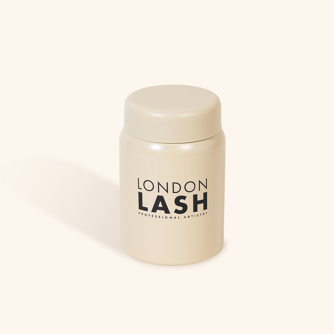 a simple image of an airtight container for lash glue