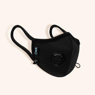 a side-on photo of the cambridge mask pro showing the ear straps