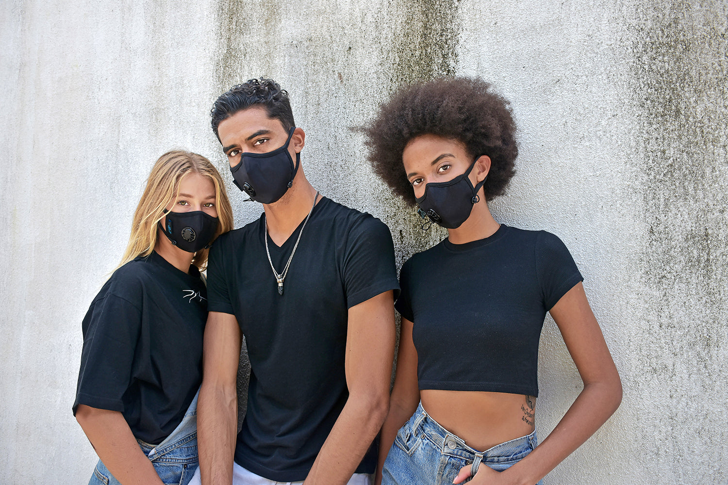 A group of three models each wearing a cambridge mask pro 