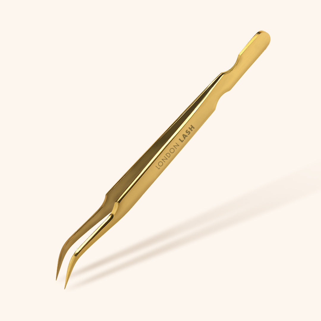 curved lash isolation tweezers in gold