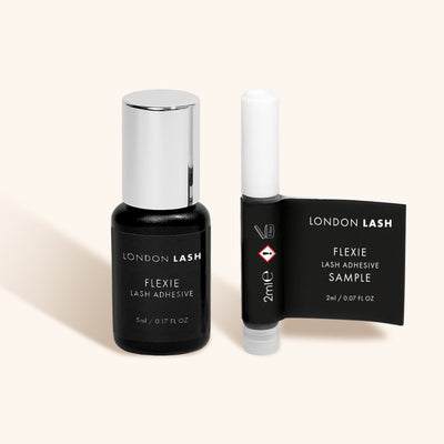 a sample bottle and a full-sized bottle of london lash flexie glue for eyelash extensions