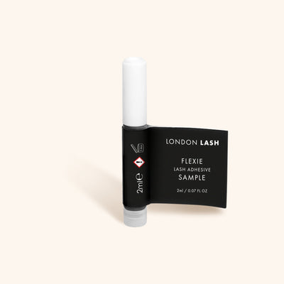 a sample bottle of london lash flexie glue for eyelash extensions