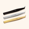 a group of three fine tip volume lash tweezers in black, silver, and gold