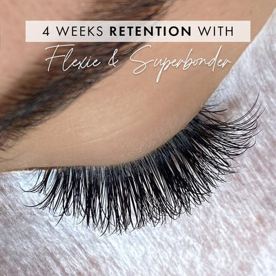 a close up of a set of eyelash extensions showing 4 weeks of lash retention with flexie lash glue