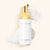 lash shampoo for eyelash extensions laying in some lash shampoo foam
