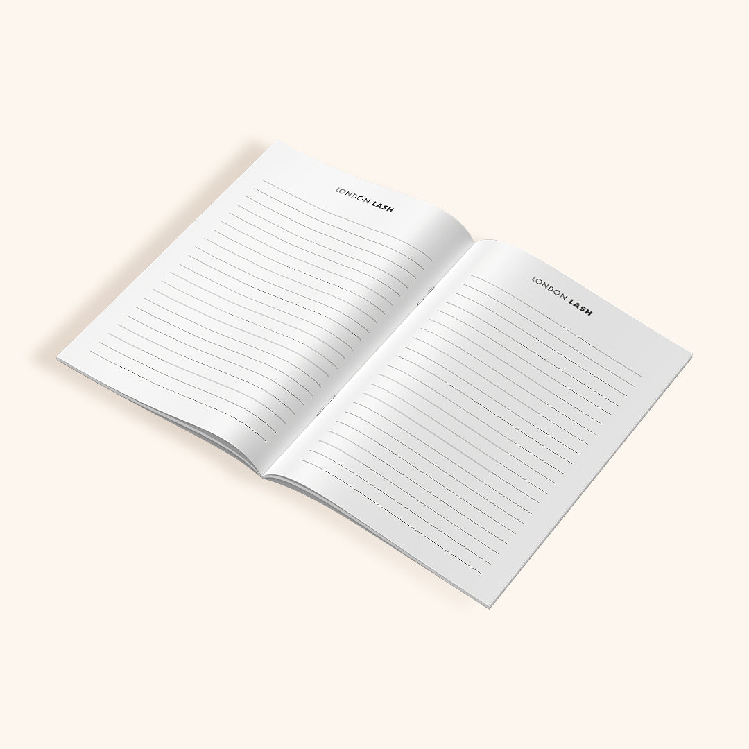 a small notebook ideal for use during lash extensions training courses