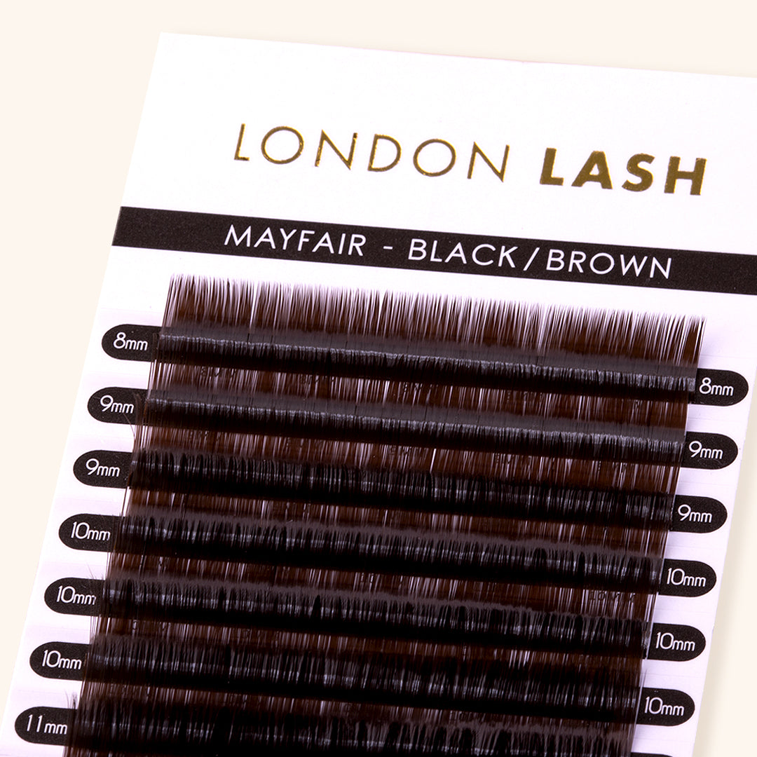 a close up of mayfair brown lash extensions