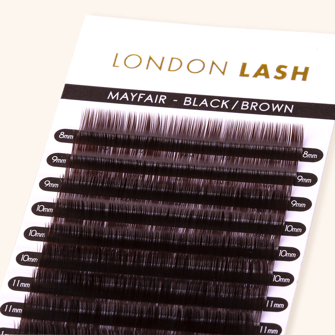 a close up of mayfair brown lash extensions