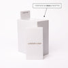 a slim white acrylic organizer with space for (and including) ten lash palettes