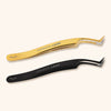 mega volume lash tweezers with a wide tip and fiber grip. A pair of black tweezers and a pair of gold lay side by side.