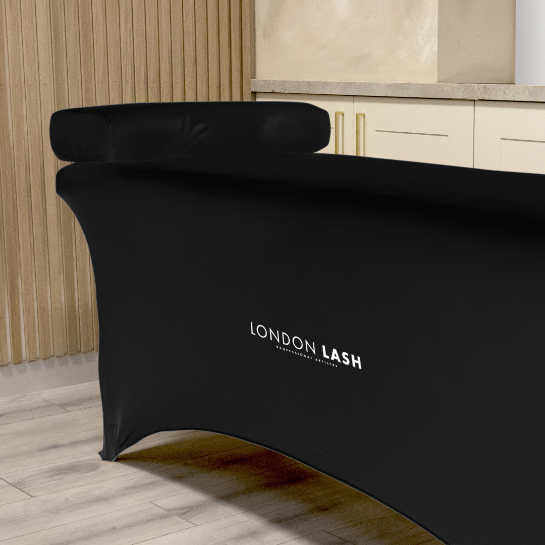 Black Faux-leather Memory Foam Lash Pillow on a lash bed