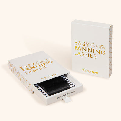 a partially open box of camellia easy fanning lashes laying next to a closed box which is standing upright