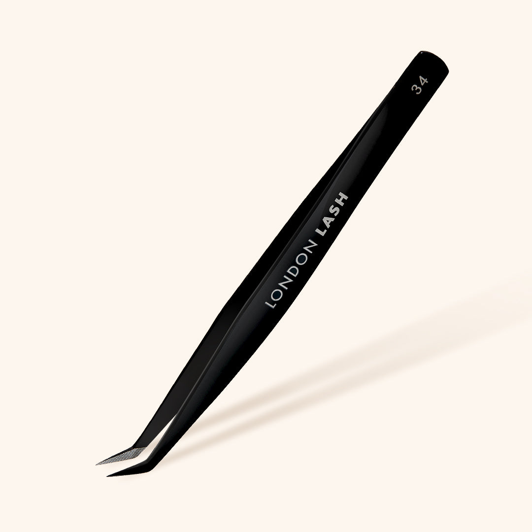 Boot lash tweezers with fiber tip
