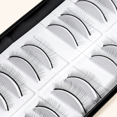a close up of practice strip lashes in their box