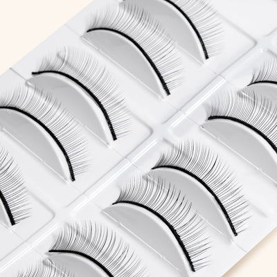 a close up of practice strip lashes in their box