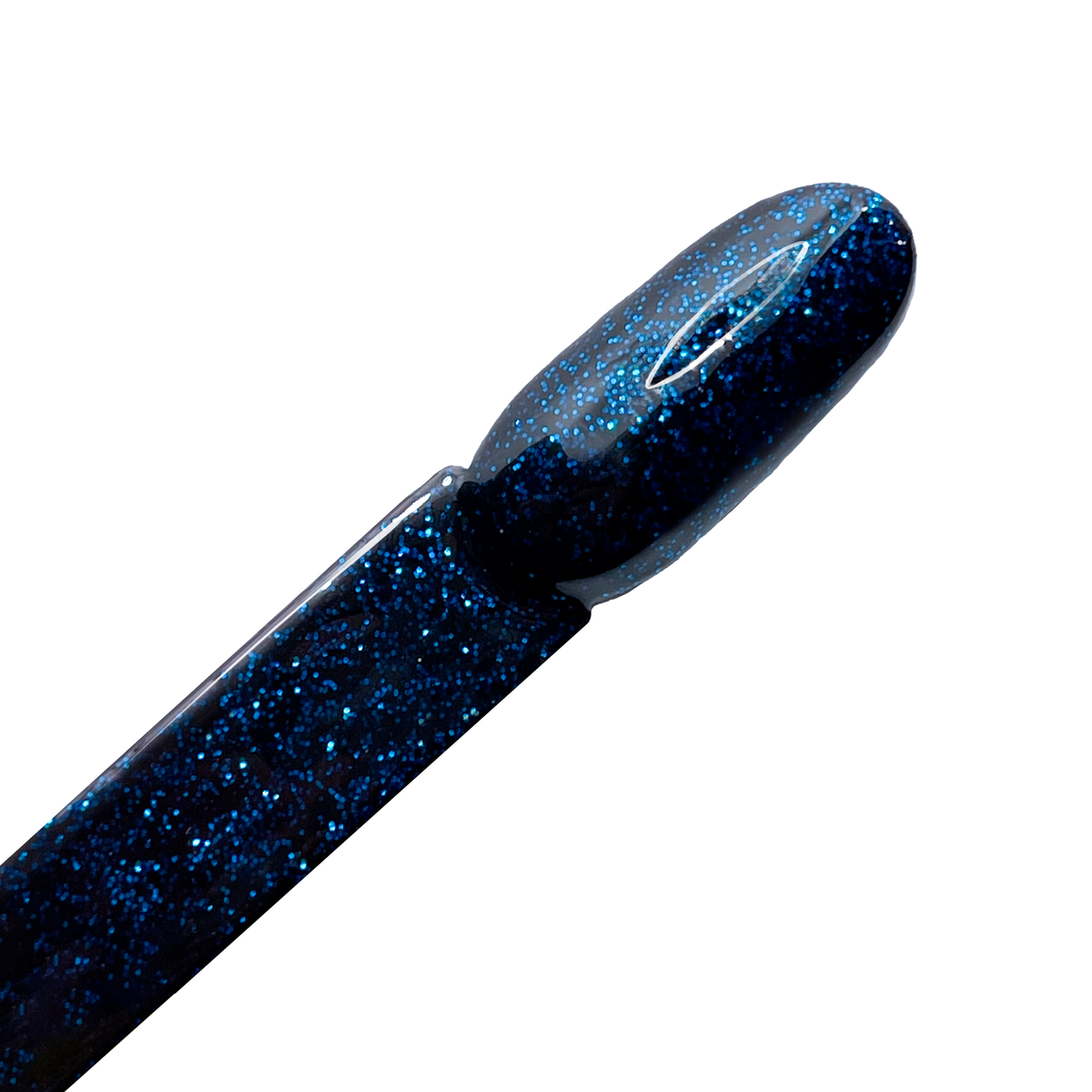 Dark sparkly blue nail polish on a nail swatch stick 