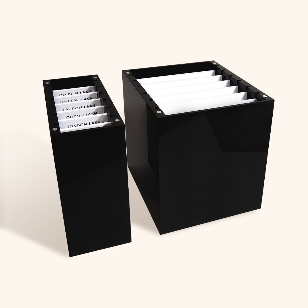 a large black lash palette organizer next to a small black palette organizer