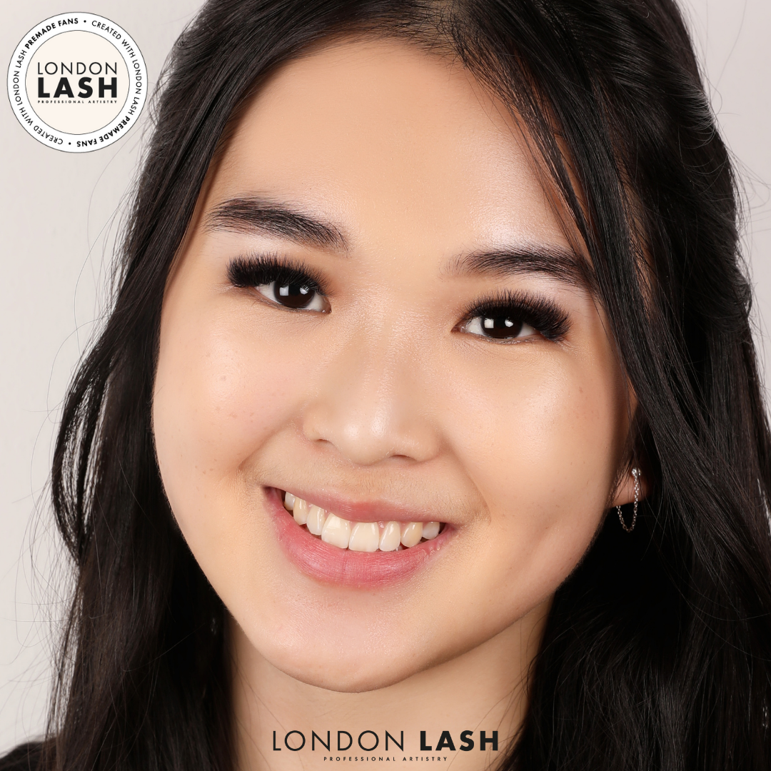 a model with a set of volume lashes using premade lash fans